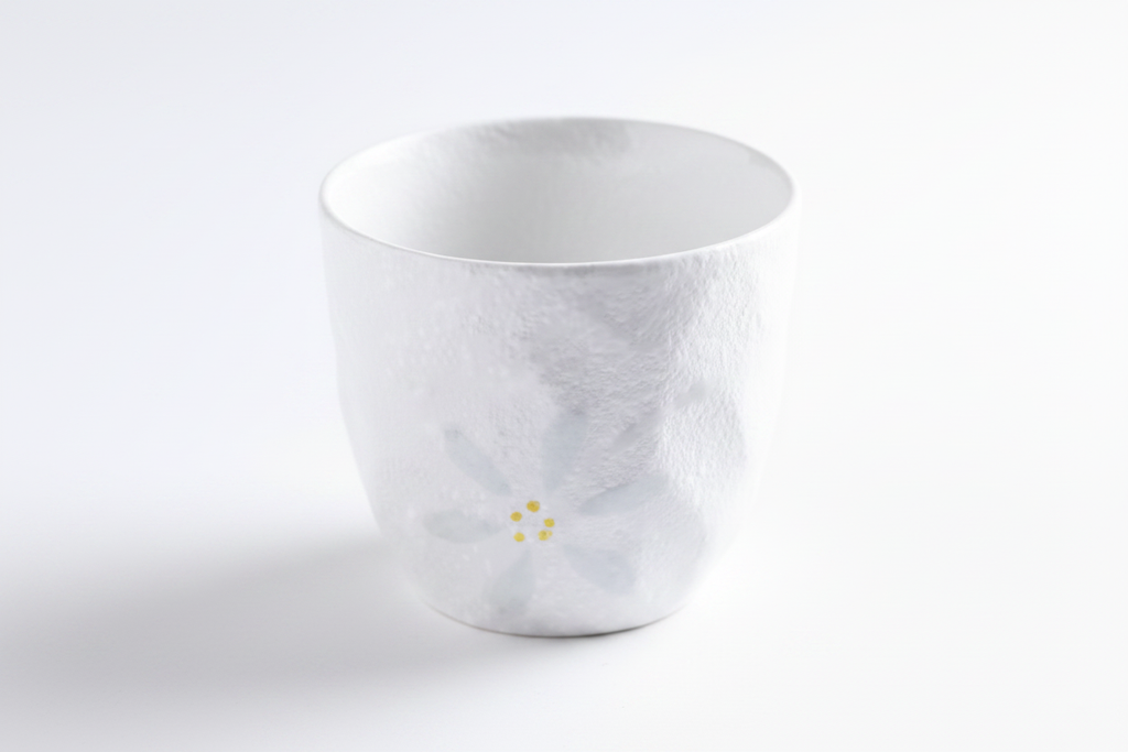 White ceramic Japanese tea cup top-down view