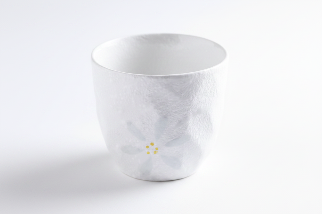 White ceramic Japanese tea cup top-down view